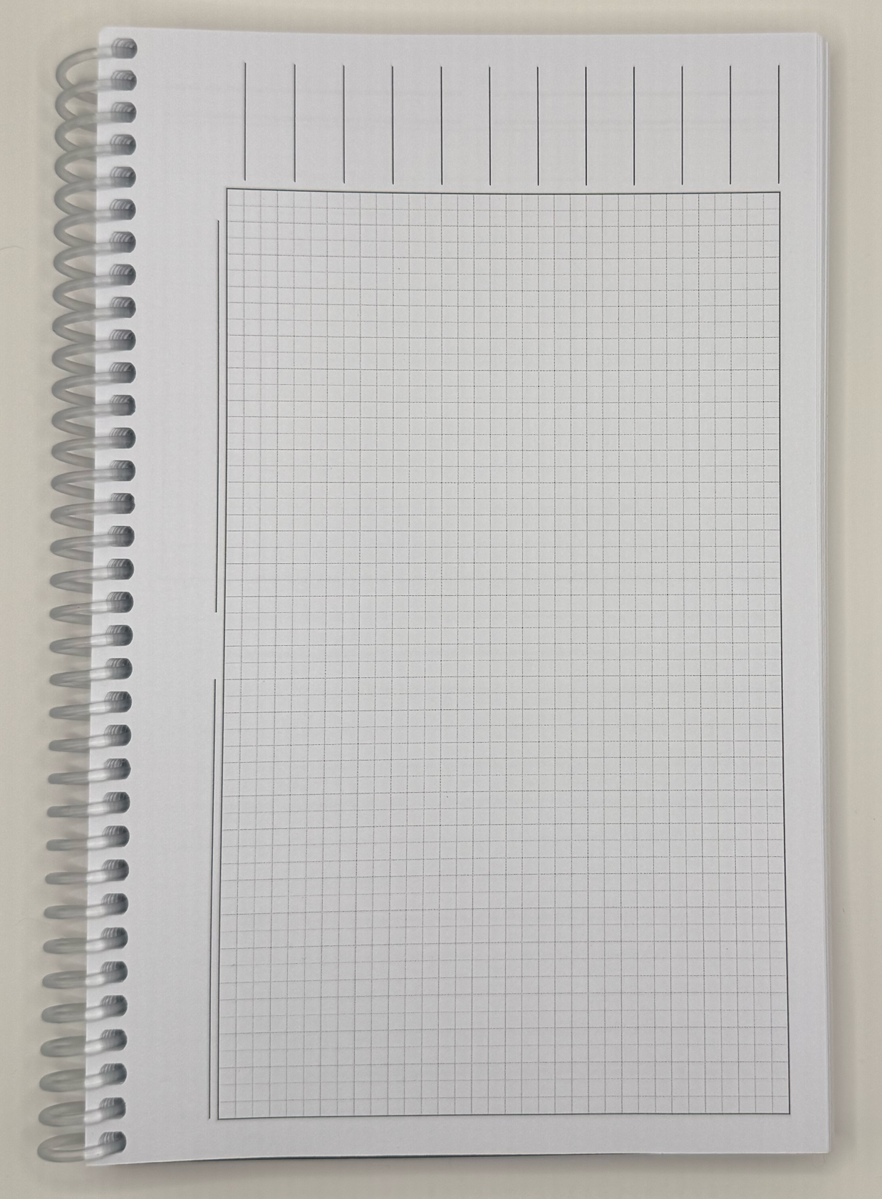 Engineering graph paper for drawing layouts and floor plans inside the Dungeon Designer's Notebook.
