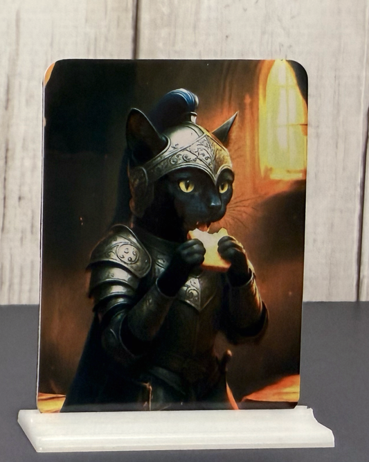 Magnet featuring a black cat in armor holding a sandwich