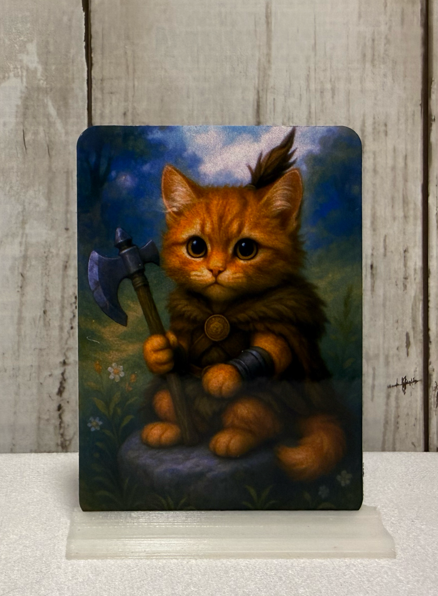 Magnet featuring a purrserker cat holding an axe.
